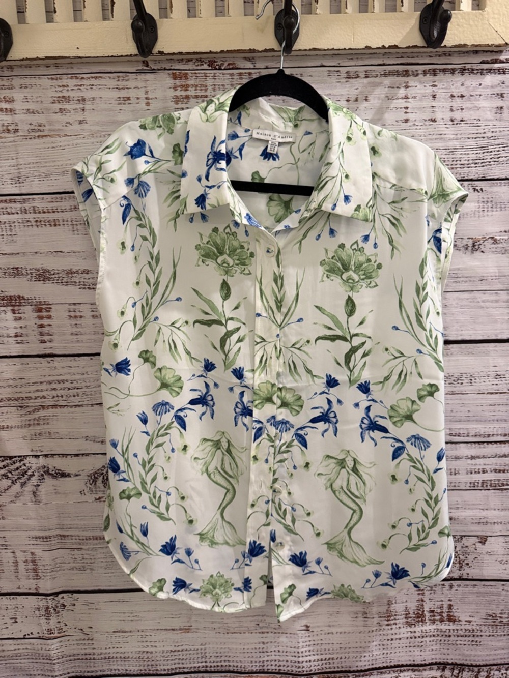Sleeveless White Floral Button-Up Shirt with Green & Blue Print